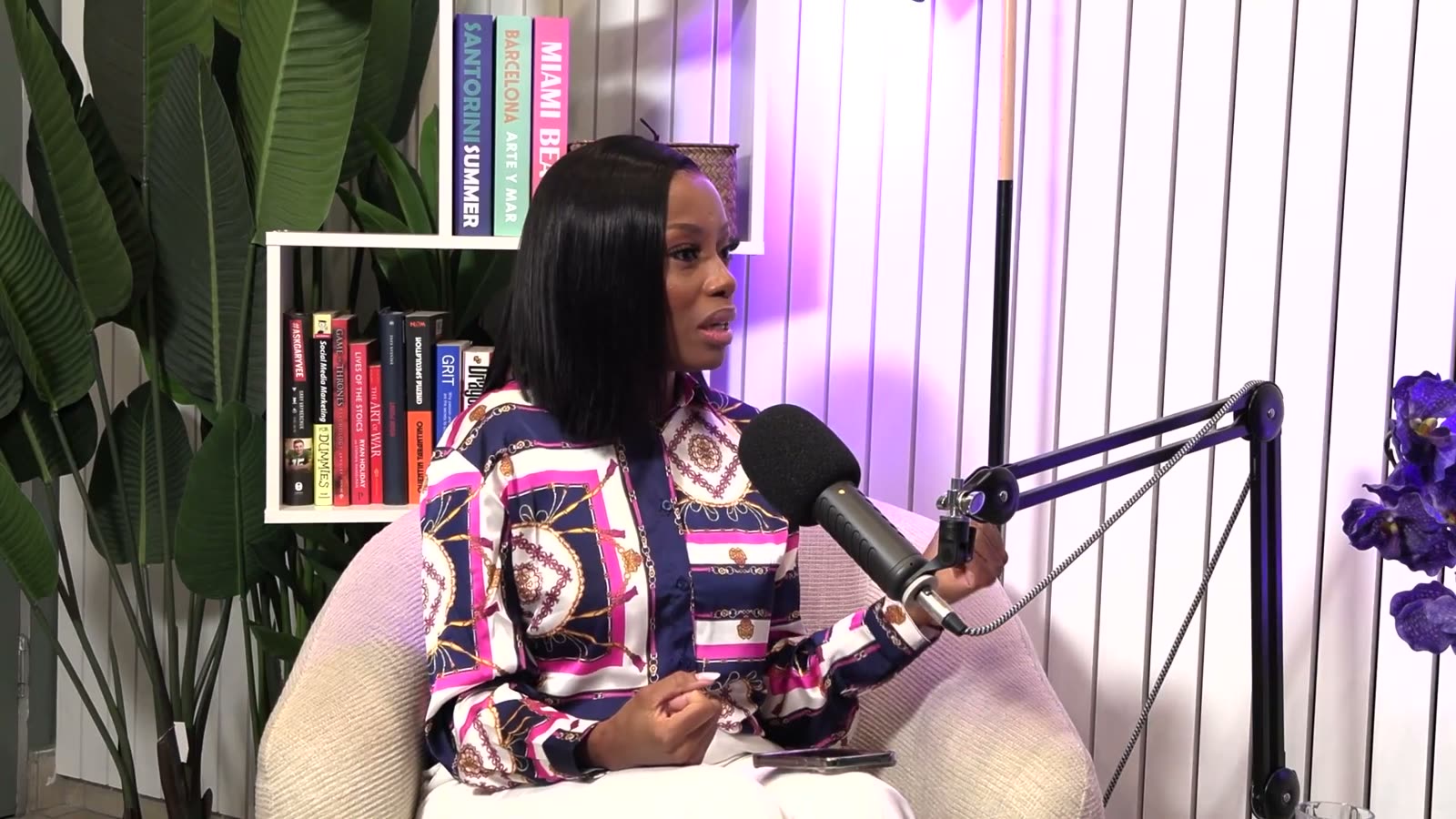 Khabo Mnguni speaking into a studio microphone during her 37 minute podcast interview with Silindo Mabena, published 4 August 2026